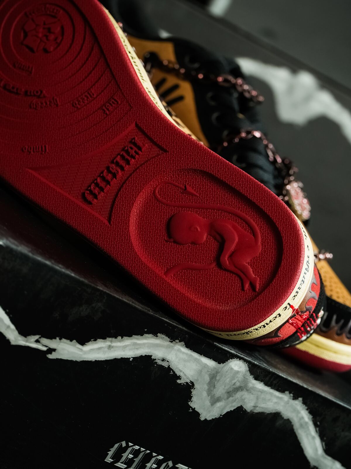 Real Inferno outsole attached to the shoe, photographed on its box