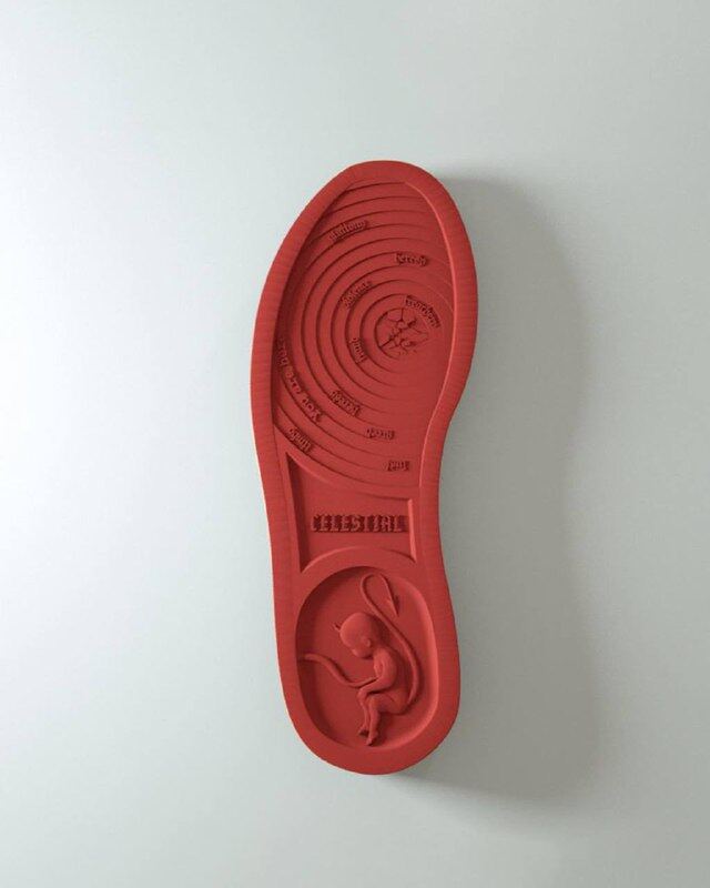 Complete red outsole component photographed separately