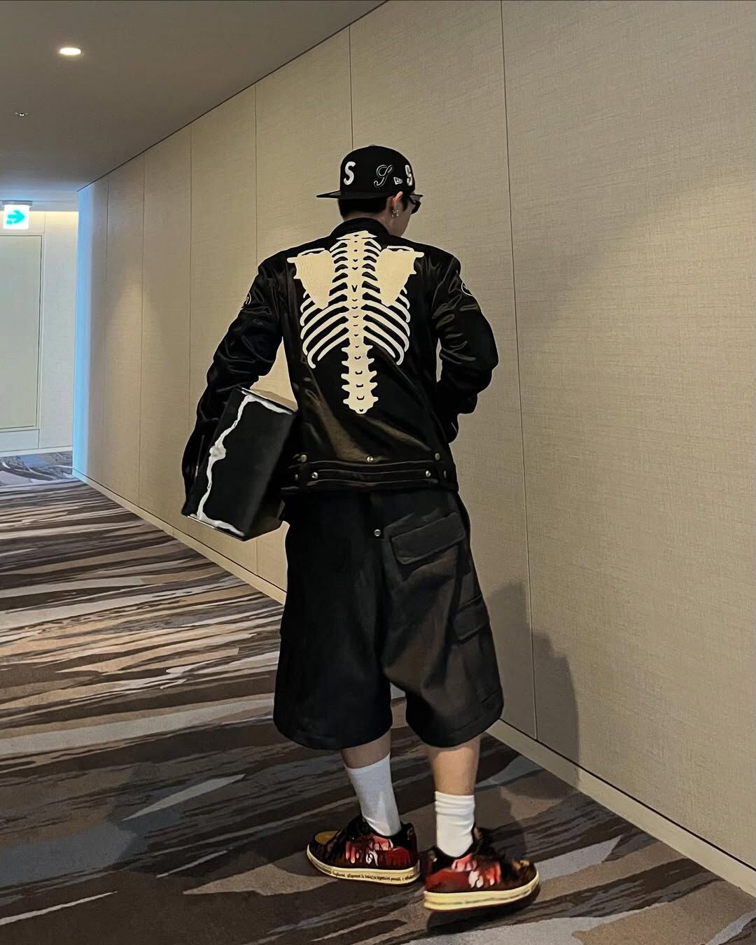 Inferno with black shorts and a skeleton jacket